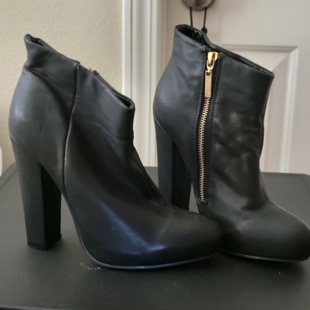Black Express heeled booties size 8